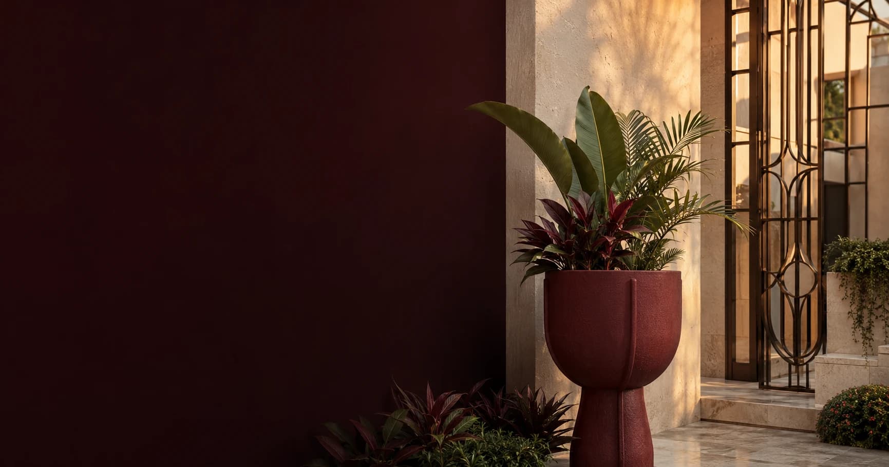 Concept visual: wrought-iron entrance and landscaped planter at a premium residence